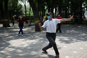 عکس/ بازگشت شلوغی به خیابان‌های پکن