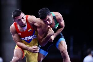 عکس / محمدرضا گرایی حریف کلمبیایی خود را شکست داد